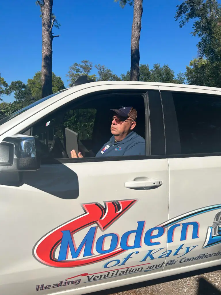 Modern Air of Katy service tech arriving on the job
